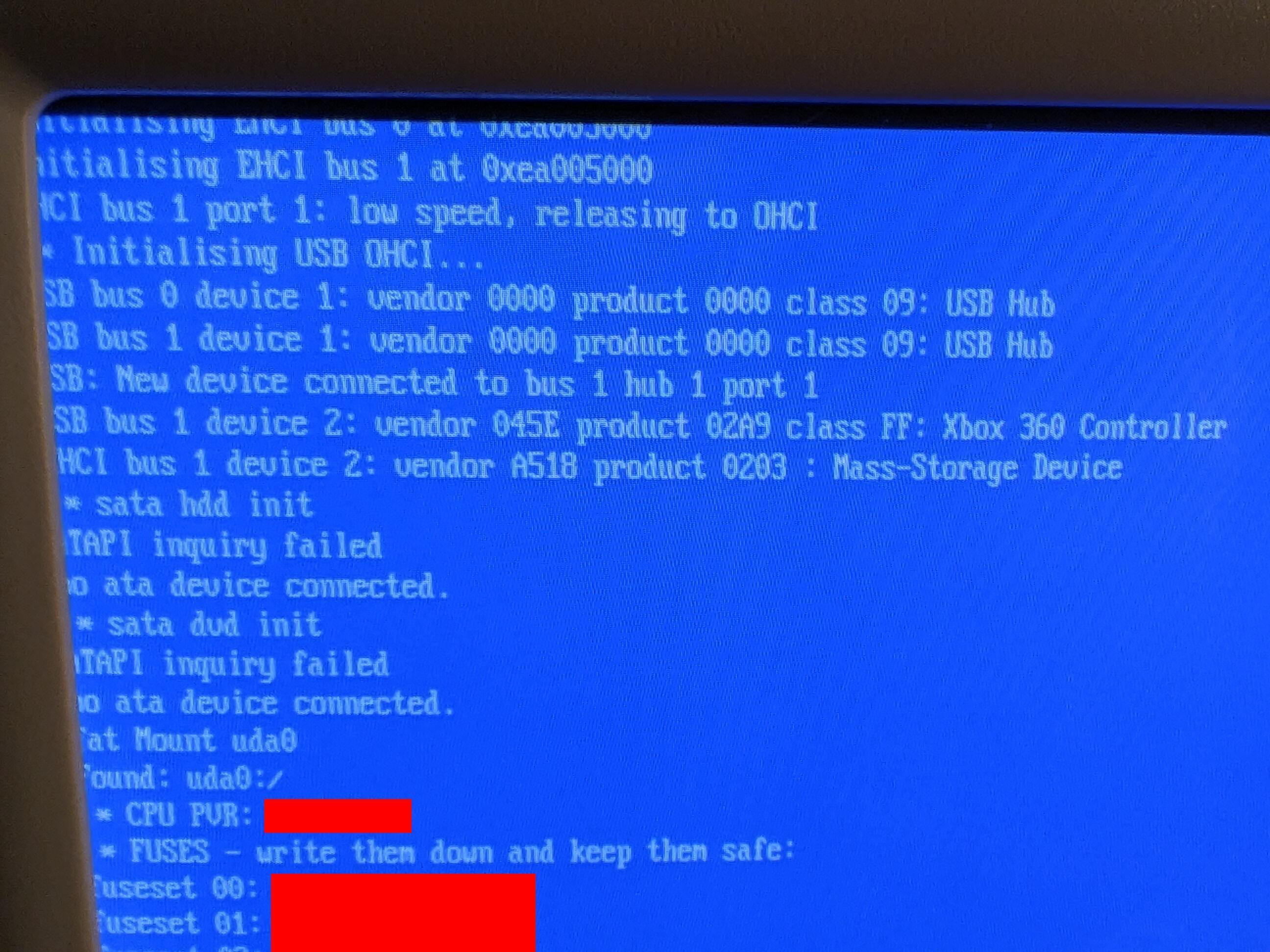 Debug output from Xell. One line states, "XHCI bus 1 device 2: vendor A618 product 0203: Mass-Storage Device". This indicates that Xell has recognized a USB mass storage device, AKA, a flash drive.