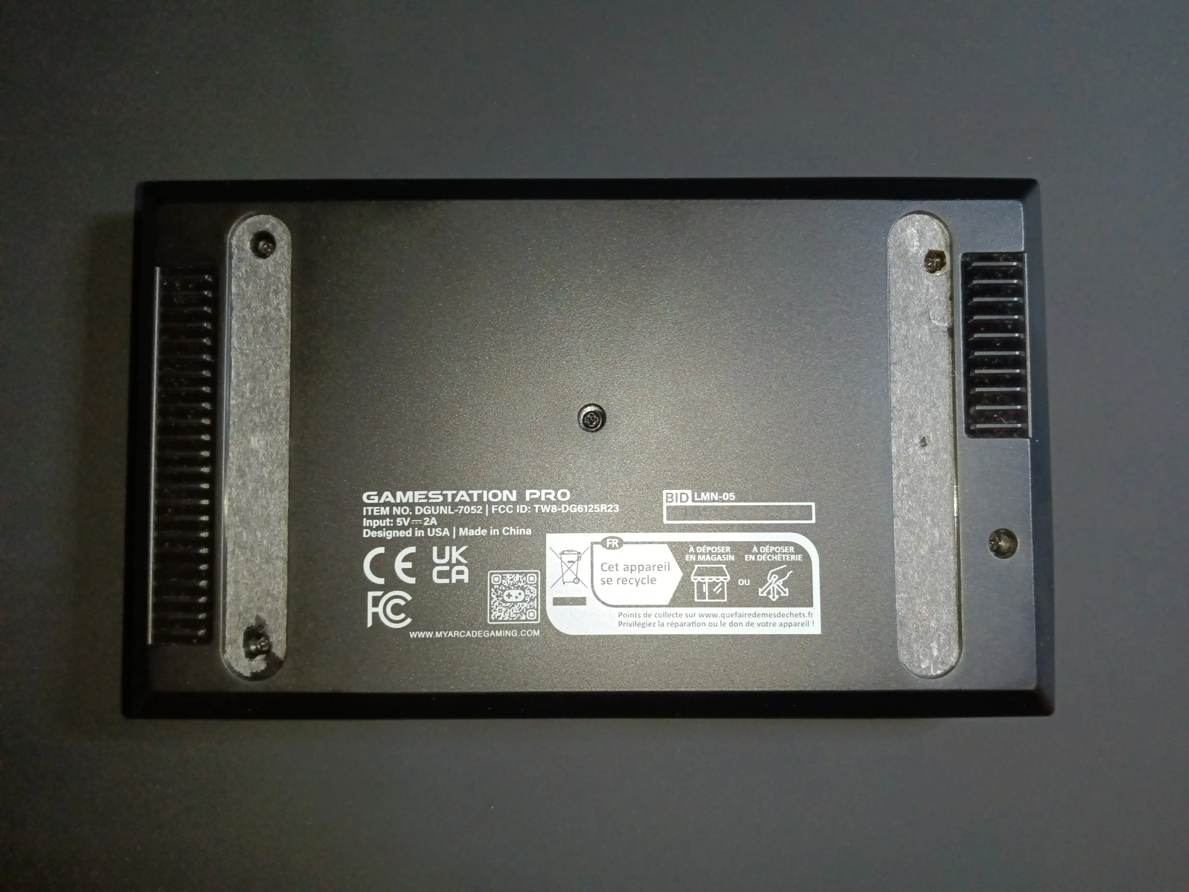 Bottom face of the console.